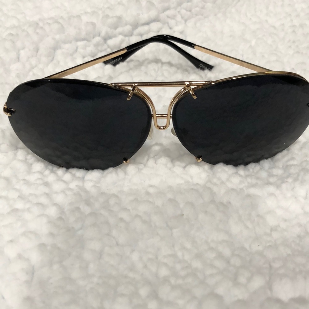 Black and gold large women’s sunglasses